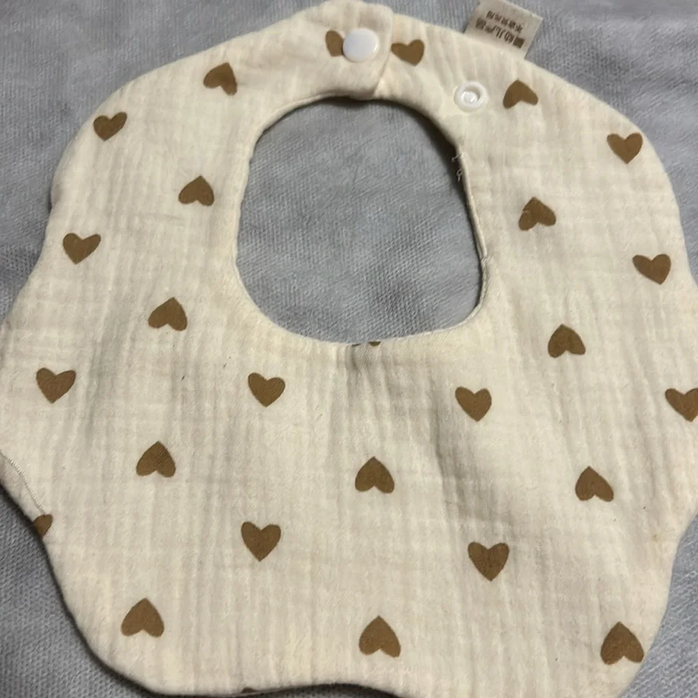 six Muslin bibs